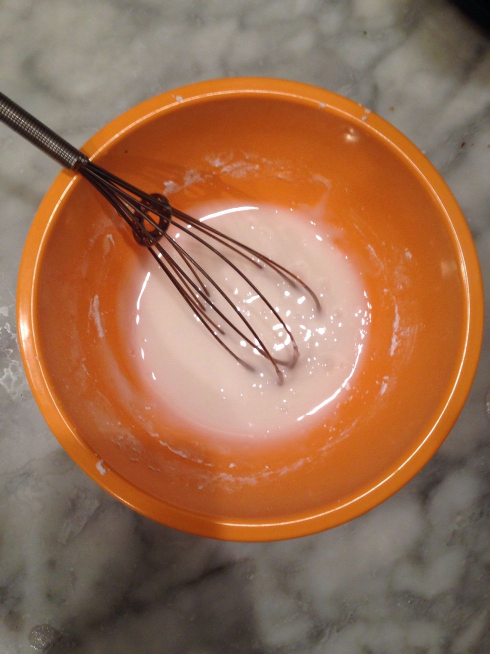 Mix powdered sugar and milk