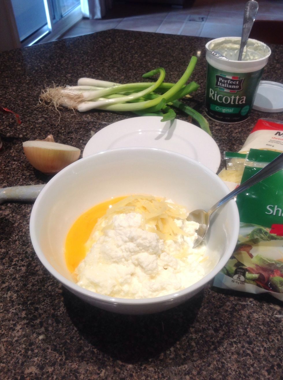 Mix ricotta, egg and Parmesan cheese (ignore shallots in this photo!)