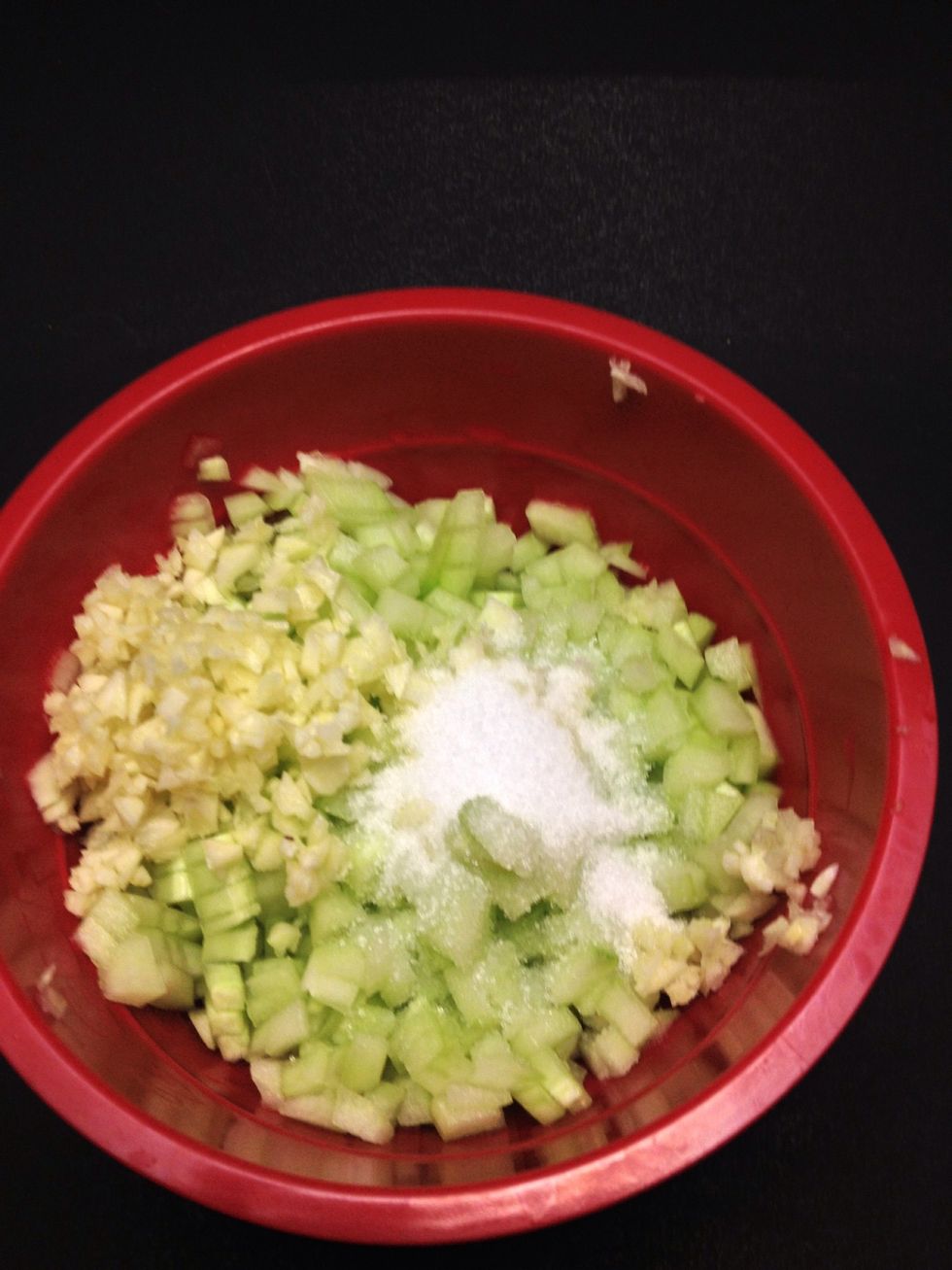 Mix salt, cucumber and garlic