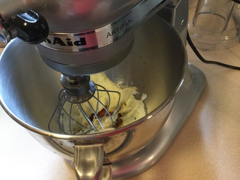 Mix softened butter , half and half and vanilla