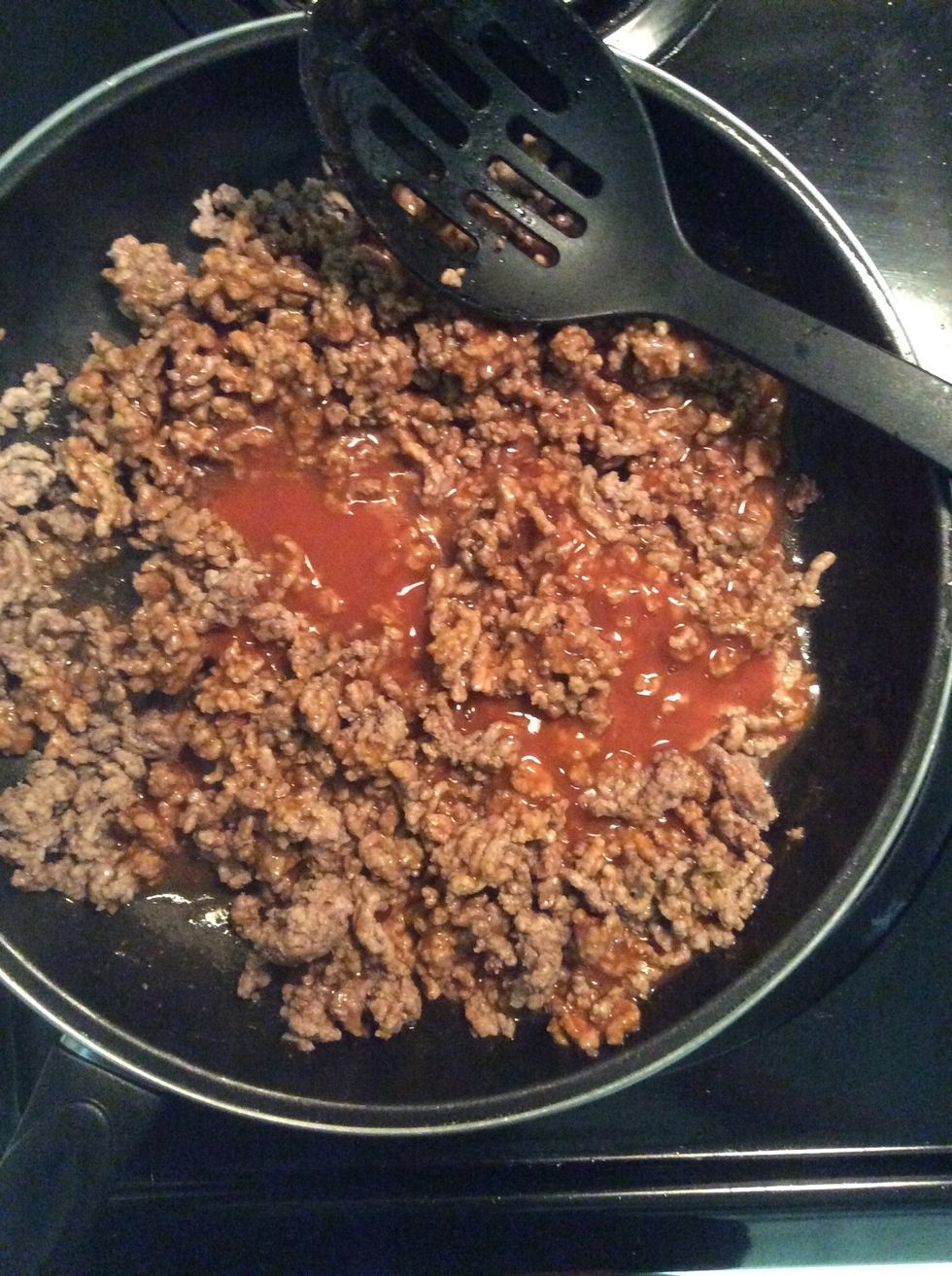 Mix taco sauce into ground beef