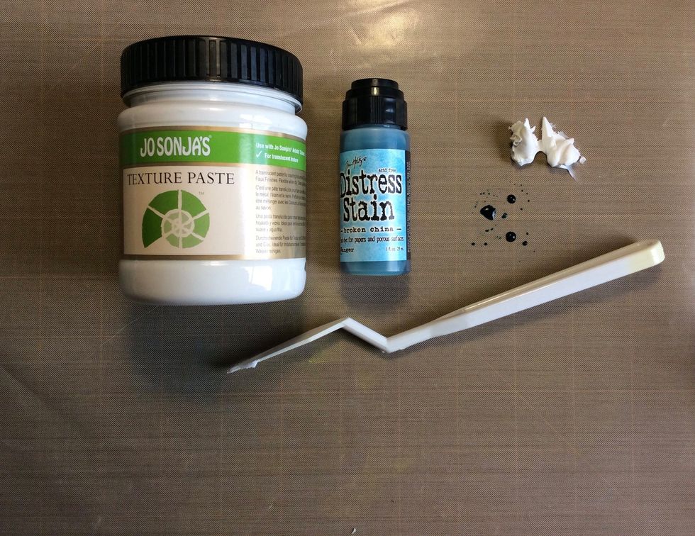 Mix texture paste and a coordinating distress stain to colourise the paste.