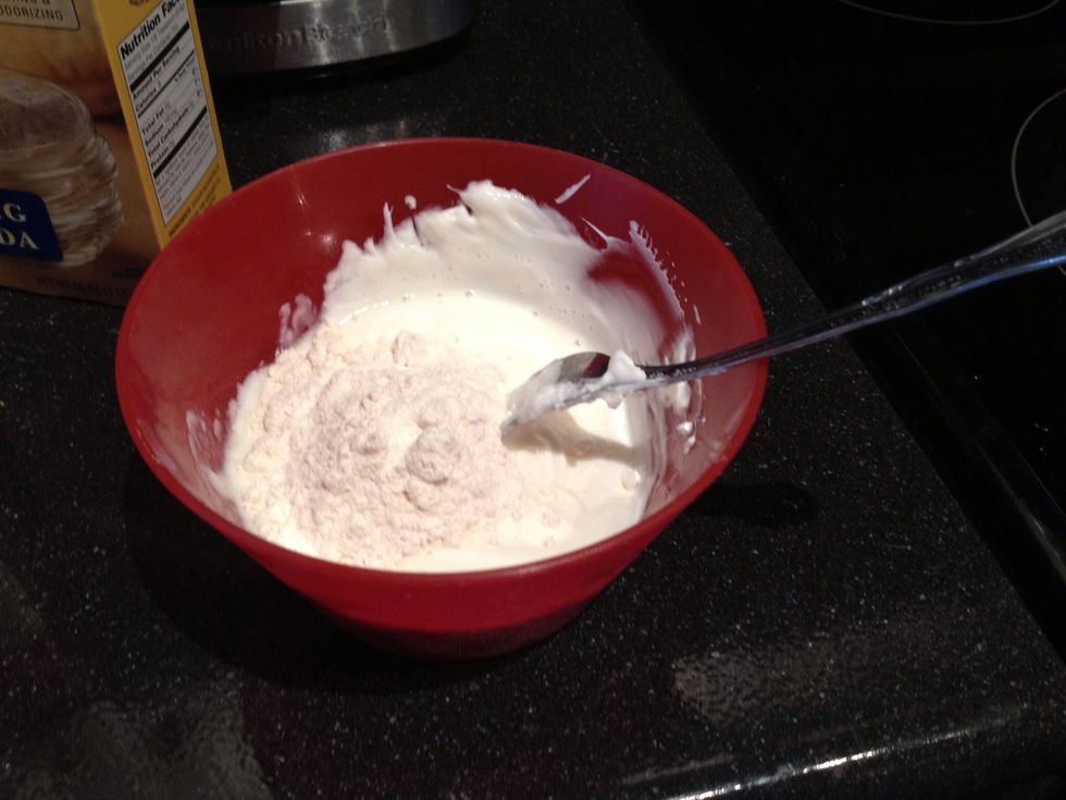 Mix that together, then add in your baking soda and flour slowly. Mix some more.