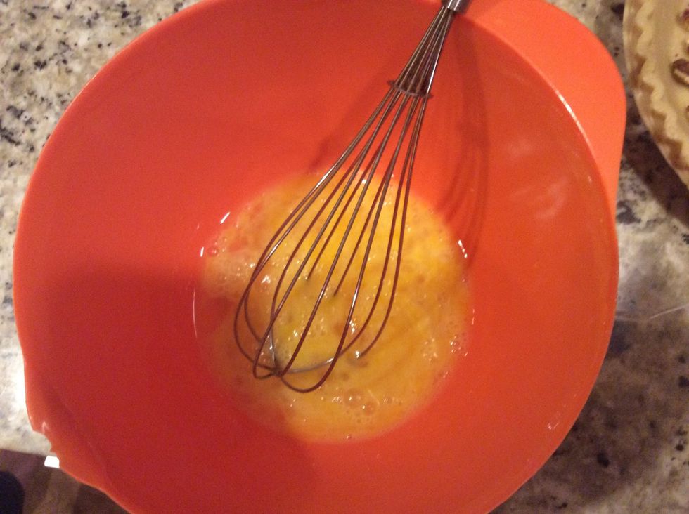 Mix the 2 eggs until they're light yellow