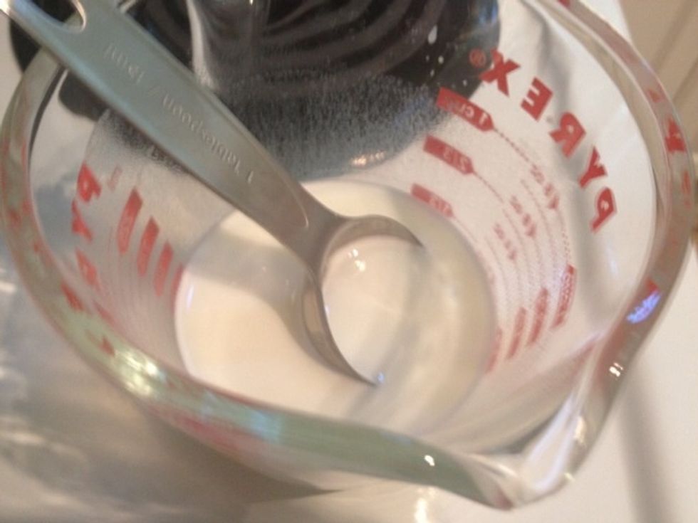 Mix the baking soda and milk together. Use a plastic or wood tool, and not metal, to mix.