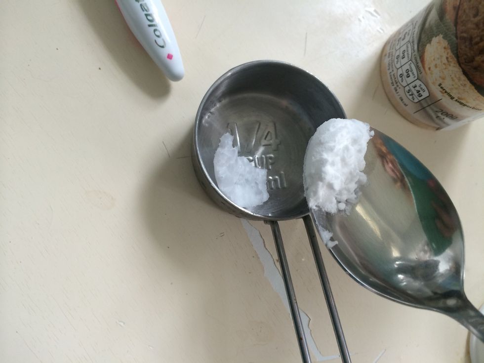 Mix the baking soda with a little off the coconut oil