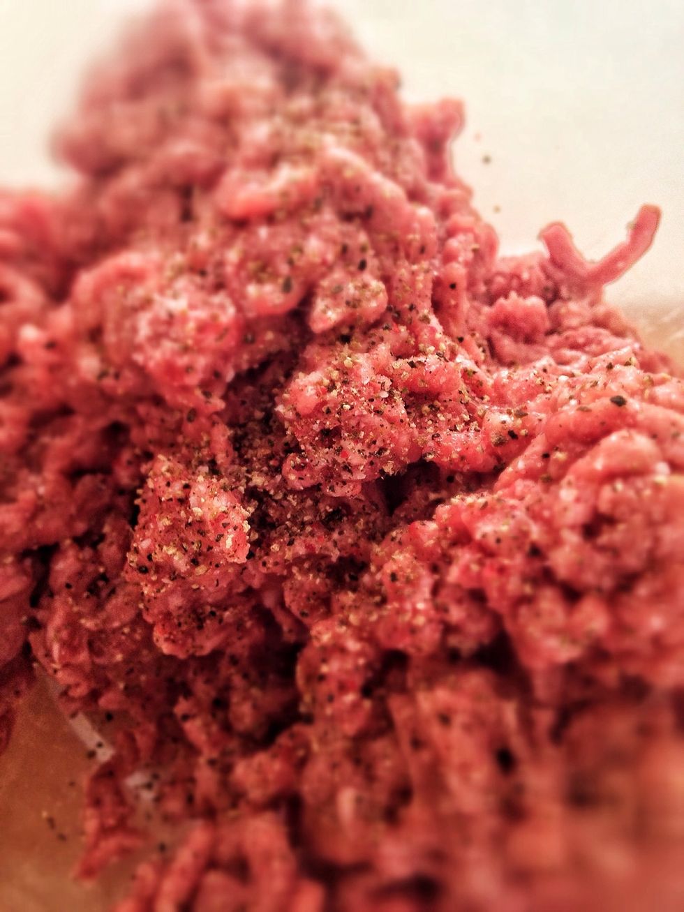 Mix the beef by hand in a bowl and add the free range egg, this will help bind the mixture together, season with rock salt and black pepper