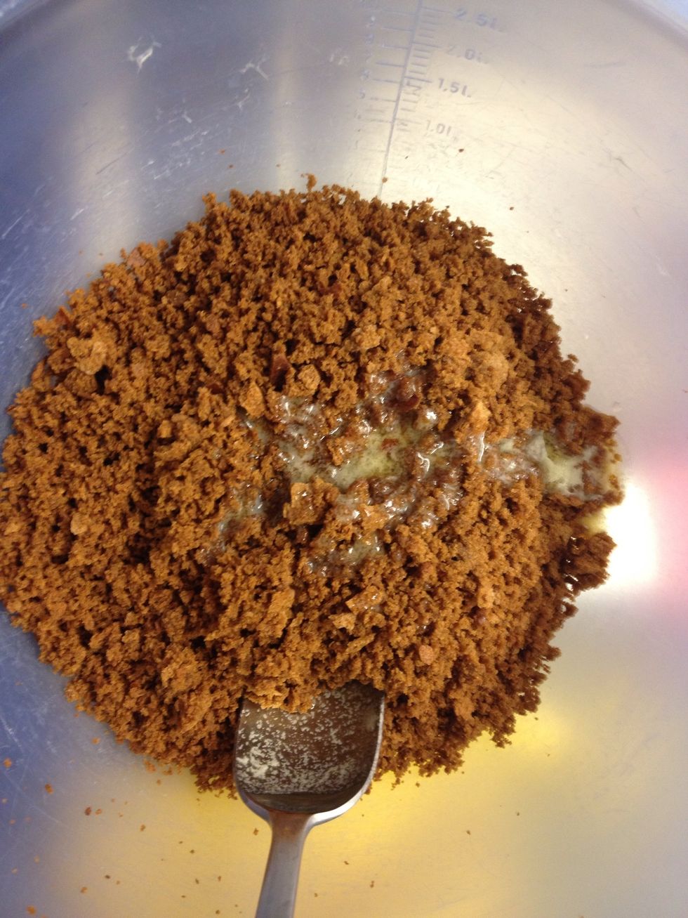 Mix the bread crumbs with the melted butter.