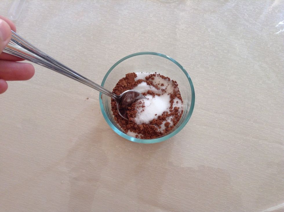 Mix the cocoa powder with the sugar