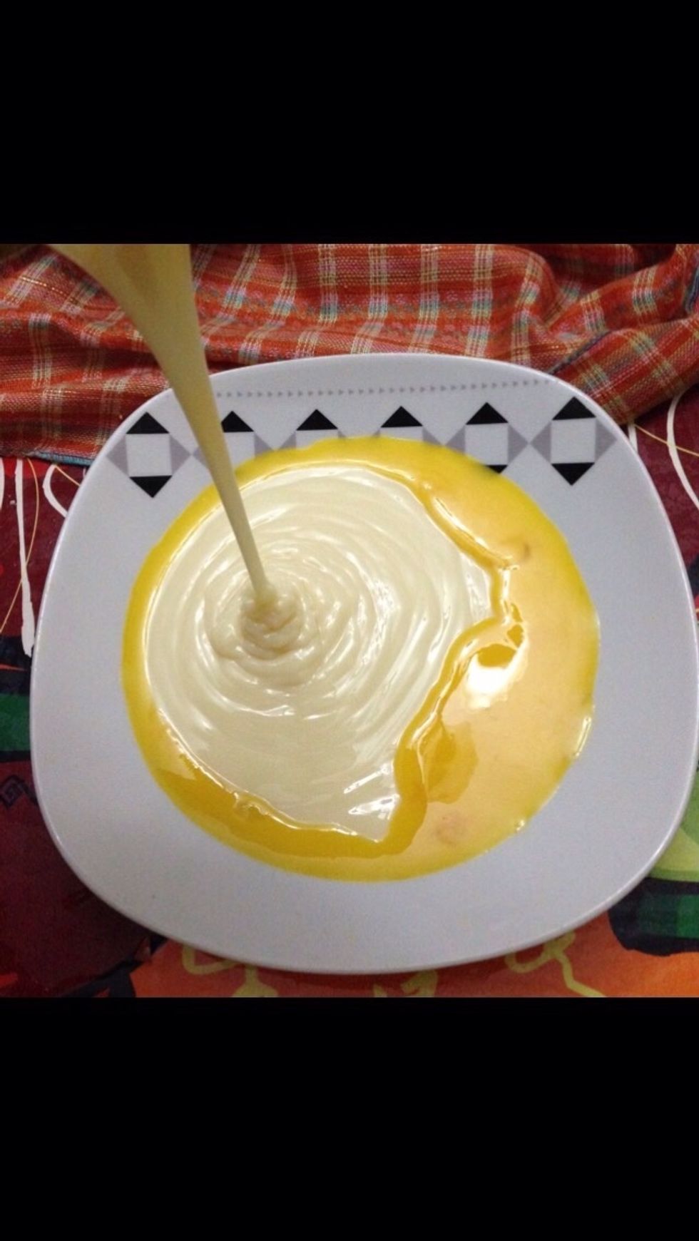 Mix the condensed milk and the egg yolks