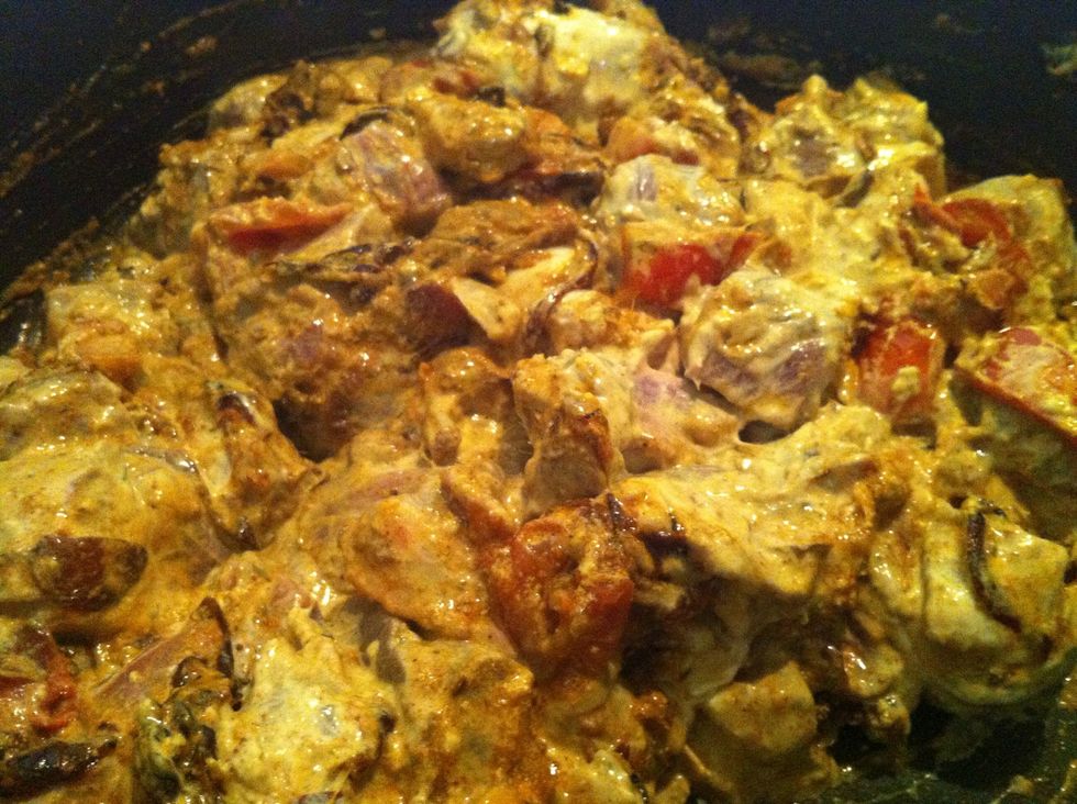 Mix the cooked spice and lamb through. Add 1 tbsp ghee and 1/2 cup water to the lamb. Cook on medium heat for 20 minutes with lid on