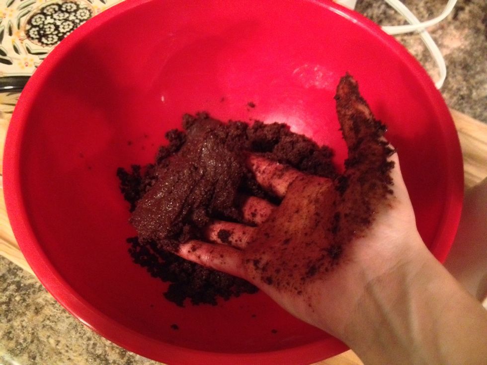 Mix the crumbs with the butter until it starts to come together.