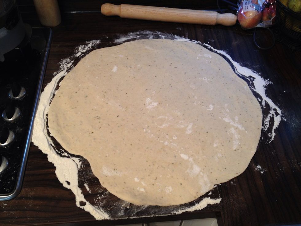 Mix the dough and flatten so it fits in your baking tray