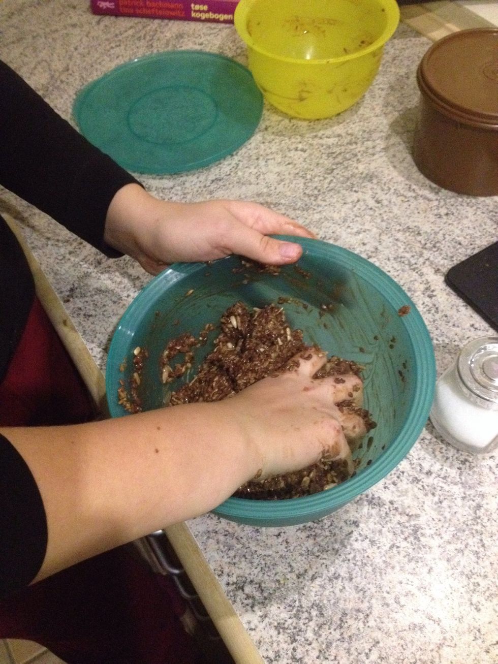 Mix the dough together with the grain/chocolate mixture. This step is best done with your hands
