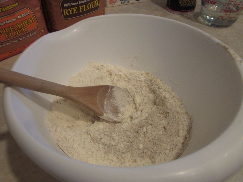 Mix the flours together. Be a kid and just do it with your hands it's more fun
