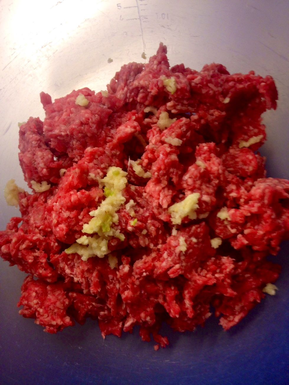 Mix the ground beef with garlic..
