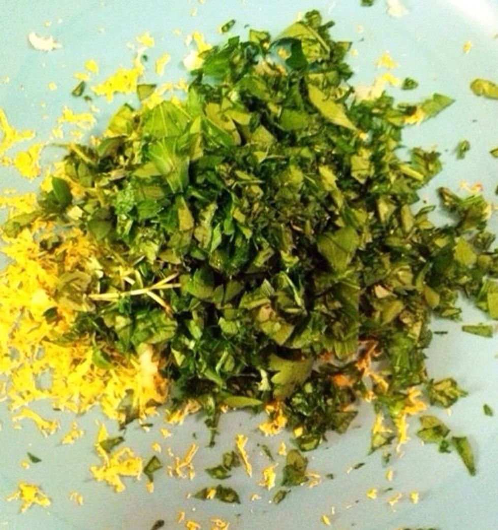 Mix the herbs with the grated lemon peel..
