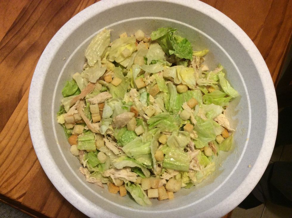 Mix the lettuce, chicken, croutons and dressing in a big bowl