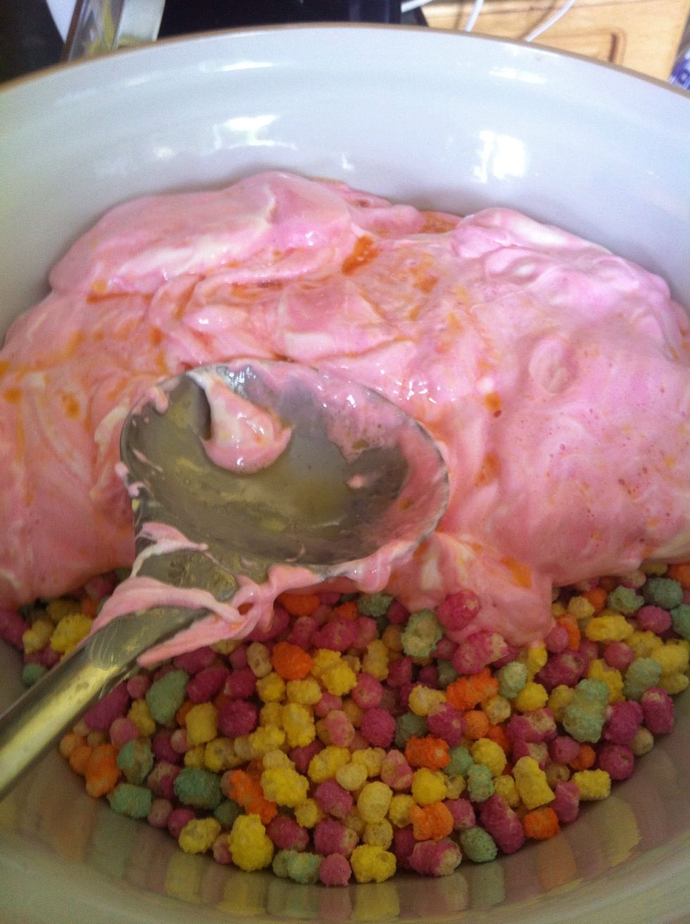 Mix the mallows and crispie treats with the melted butter