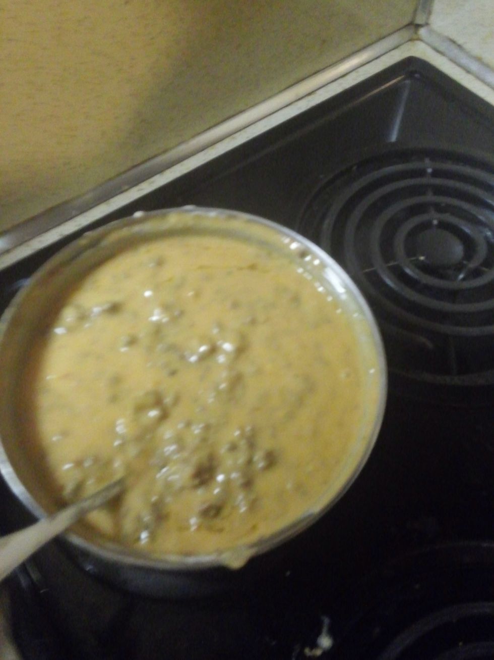 Mix the meat into the sauce, and cook on the stove