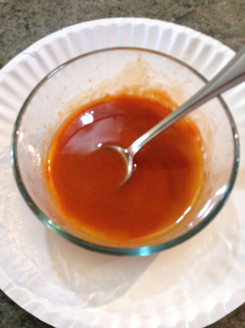 Mix the melted butter and buffalo sauce in a bowl