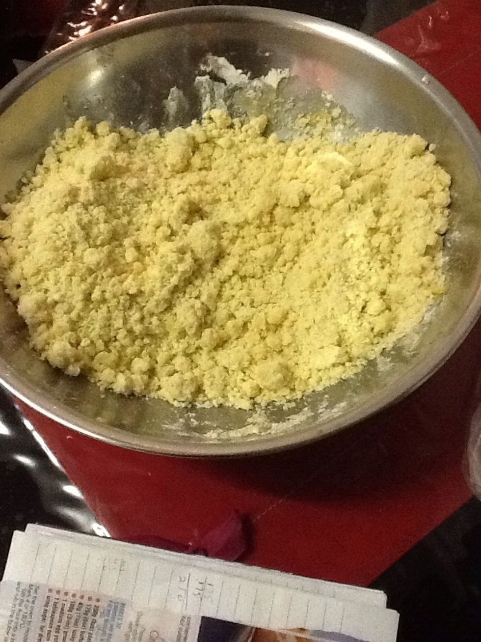 Mix the melted butter with the flour and sugar until you get a soft crumbly consistency