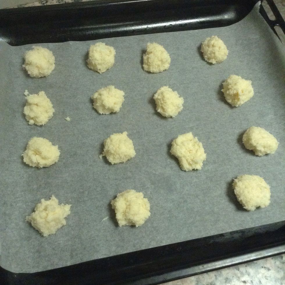 Mix the mixture well and either with spoon or with the help of scoop place on baking dish with butter paper on it