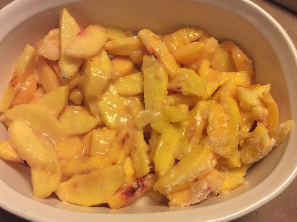 Mix the peaches and flower and sugar together to finish the filling.