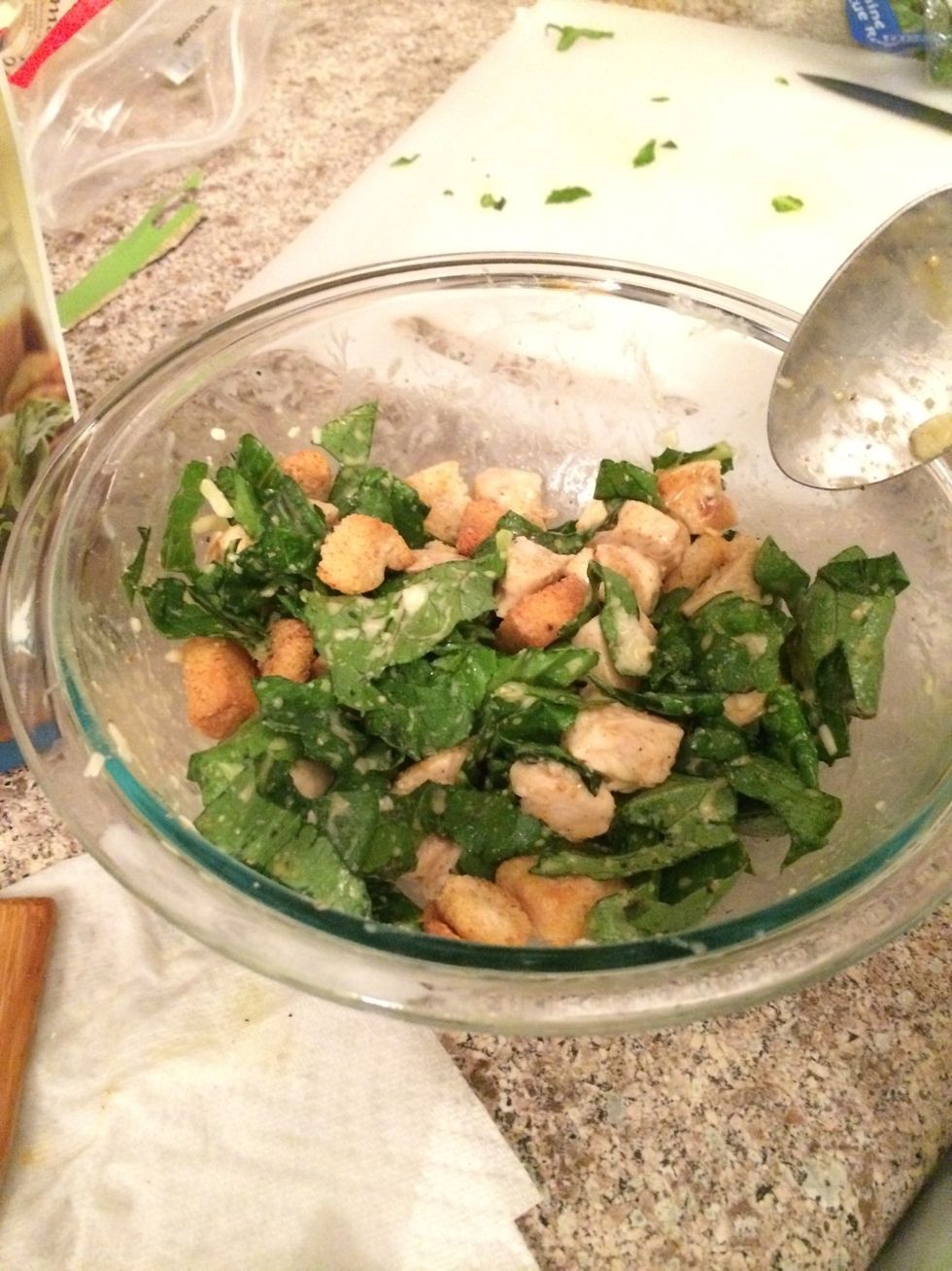 Mix the salad and the chicken together.