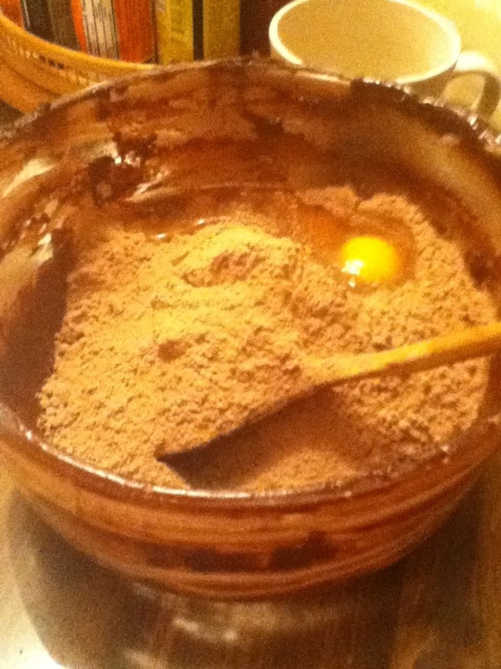 Mix the second box of brownie mix, 1 egg, 1/4 cup oil, and 1/4 cup water.