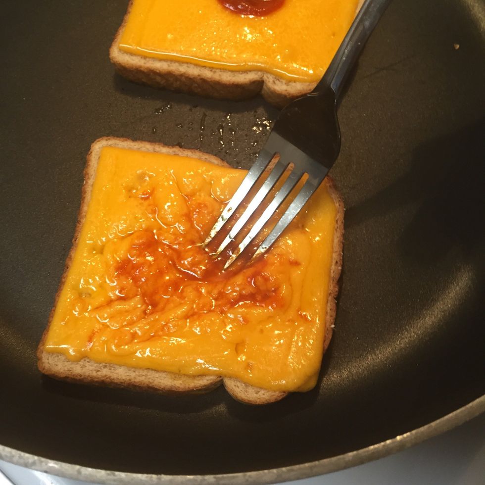 Mix the sriarcha into your melted cheese