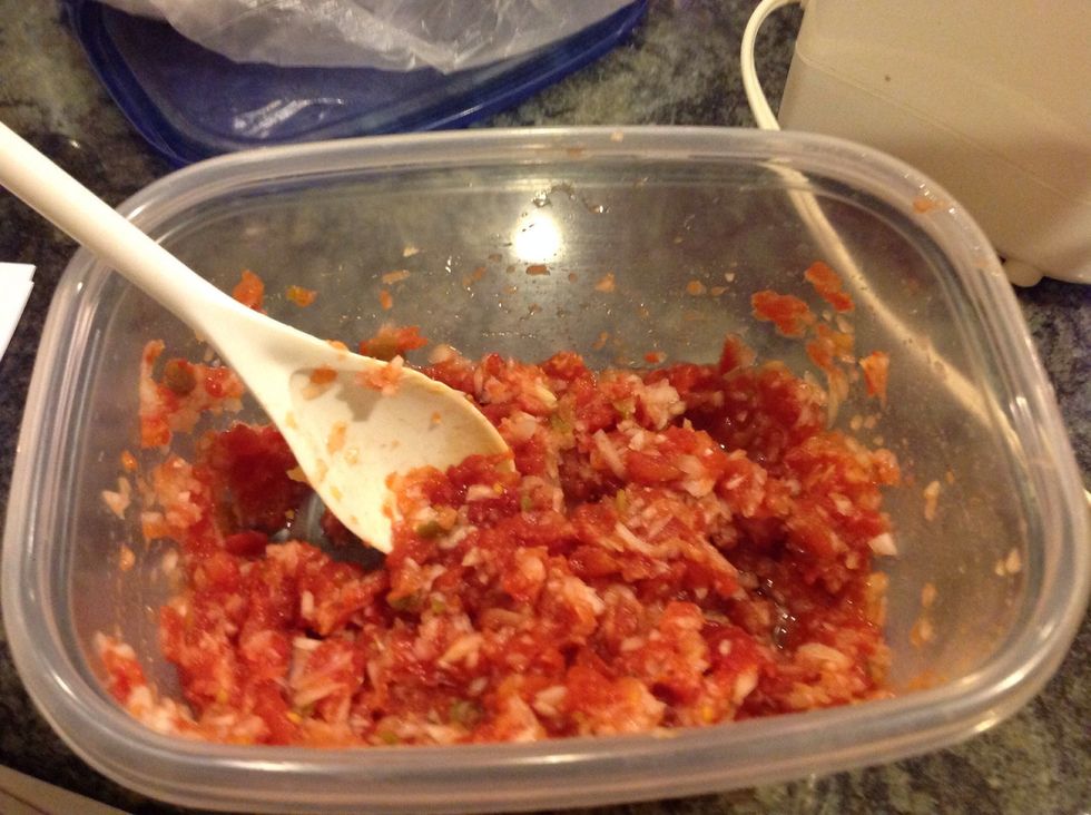 Mix the tomatoes and the onions together.