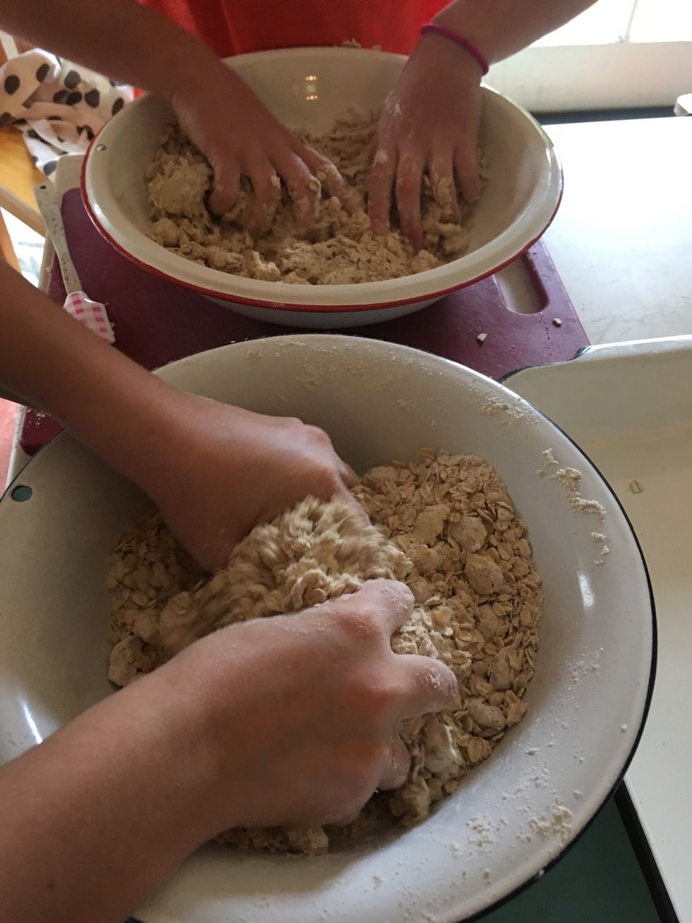 Mix the topping and make sure there are only small bits of butter. Then put the topping in a bag and put in the freezer so the topping is cold when you bake it.