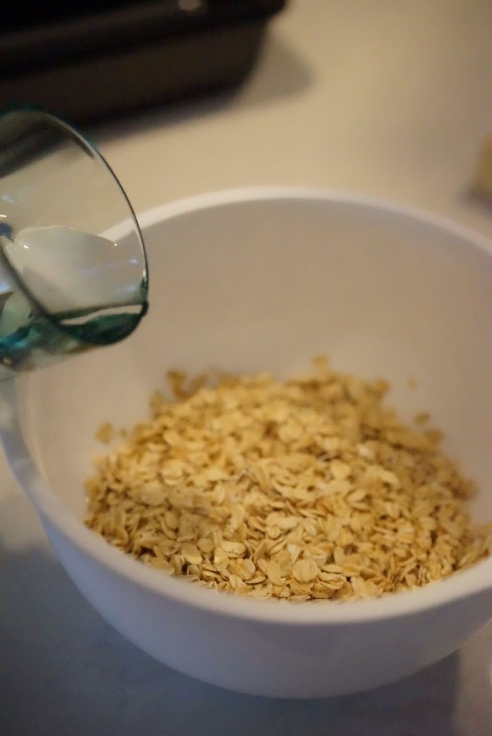 Mix the two and stir to blend with a wooden spoon. Cover and let it soak for 30 minutes at room temperature.