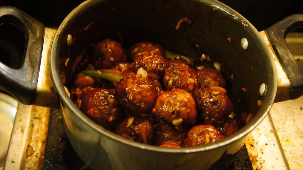 Mix the veg balls with garnishing sauce for couple of minutes..