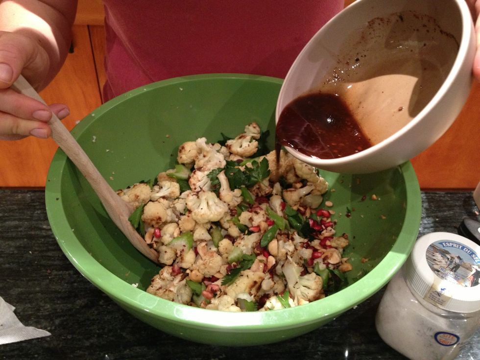 Mix the vinegarette into the bowl of ingredients.
