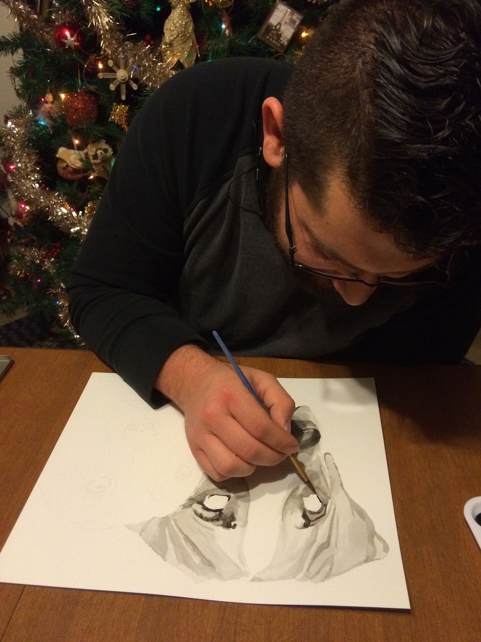 Mix the water and diluted ink. Very carefully follow the shades to your reference picture.   Artist tip: Turn your picture into a black and white photo to help aid your shading if you have problems.