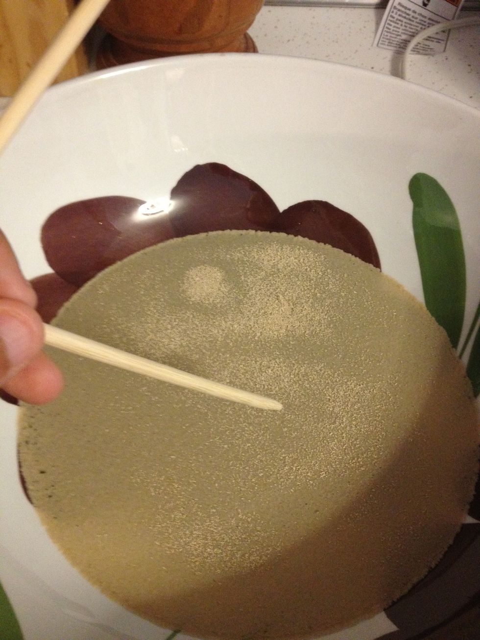 Mix the yeast with the warm water and sugar. You can add more sugar, is up to you. I use chopstick to mix.