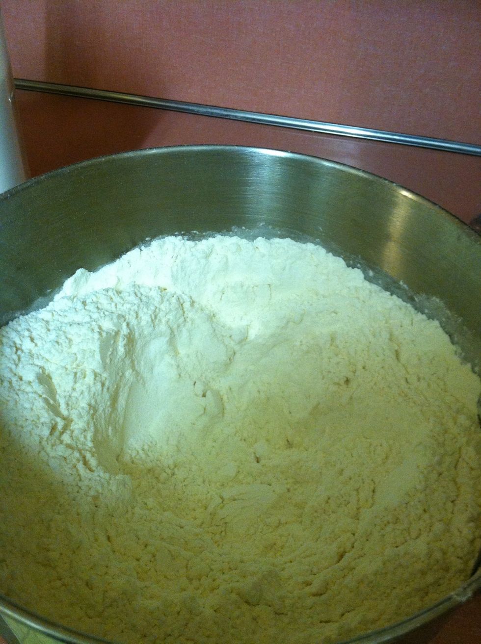 Mix those three ingredients together, then make a well in the middle of the mixture