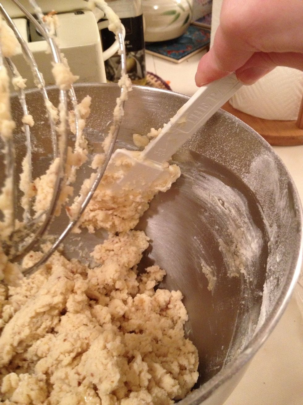 Mix til the dough begins to clump and make sure you get the sides all mixed in.