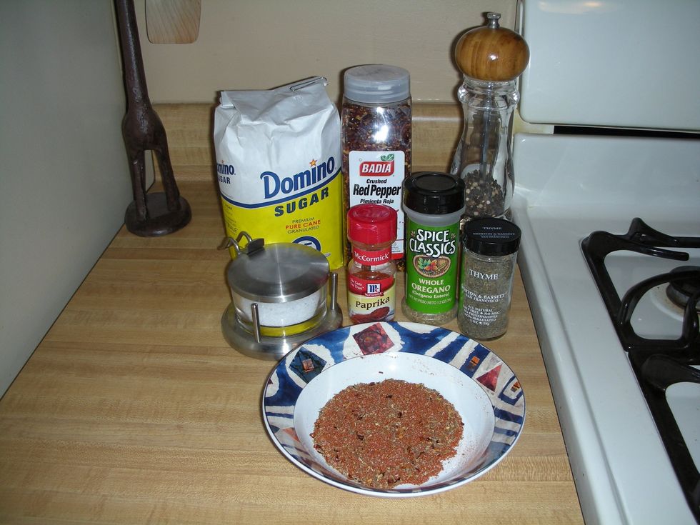 Mix together 2 teaspoons (tsp) paprika. 1/2 tsp thyme, 1/2 tsp oregano, 1/2 tsp salt, 1/2 tsp fresh cracked black pepper, 1/2 tsp sugar, 1/2 tsp red pepper flakes.