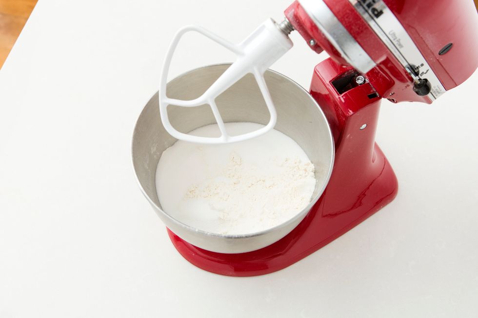Mix together all of your dry ingredients in the bowl of a stand mixer. Use the paddle attachment to mix on low.