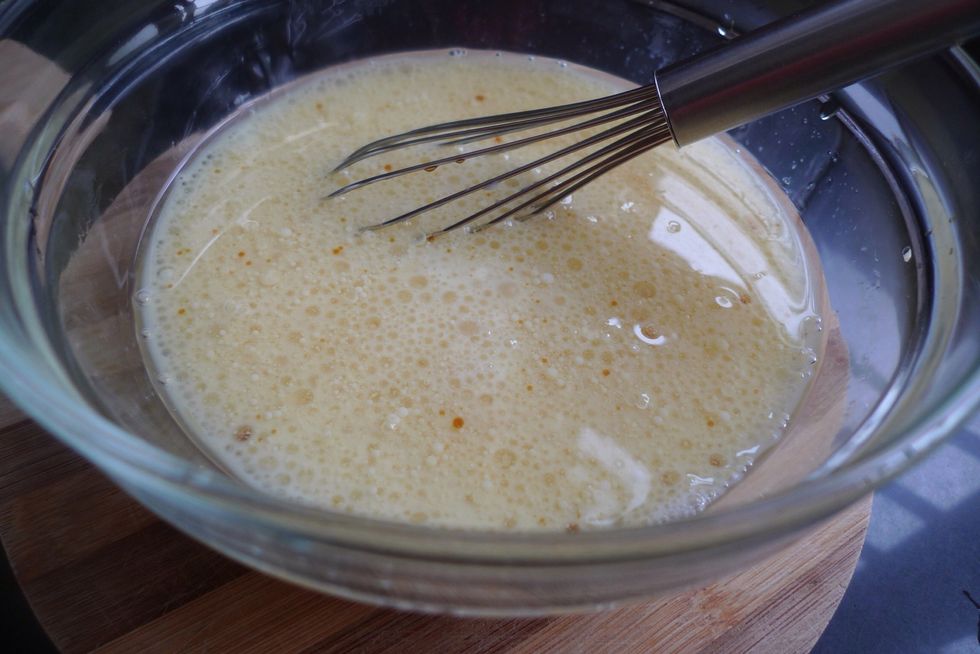 Mix together all the WET ingredients in a bowl: eggs, buttermilk, vegetable oil and vanilla extract.