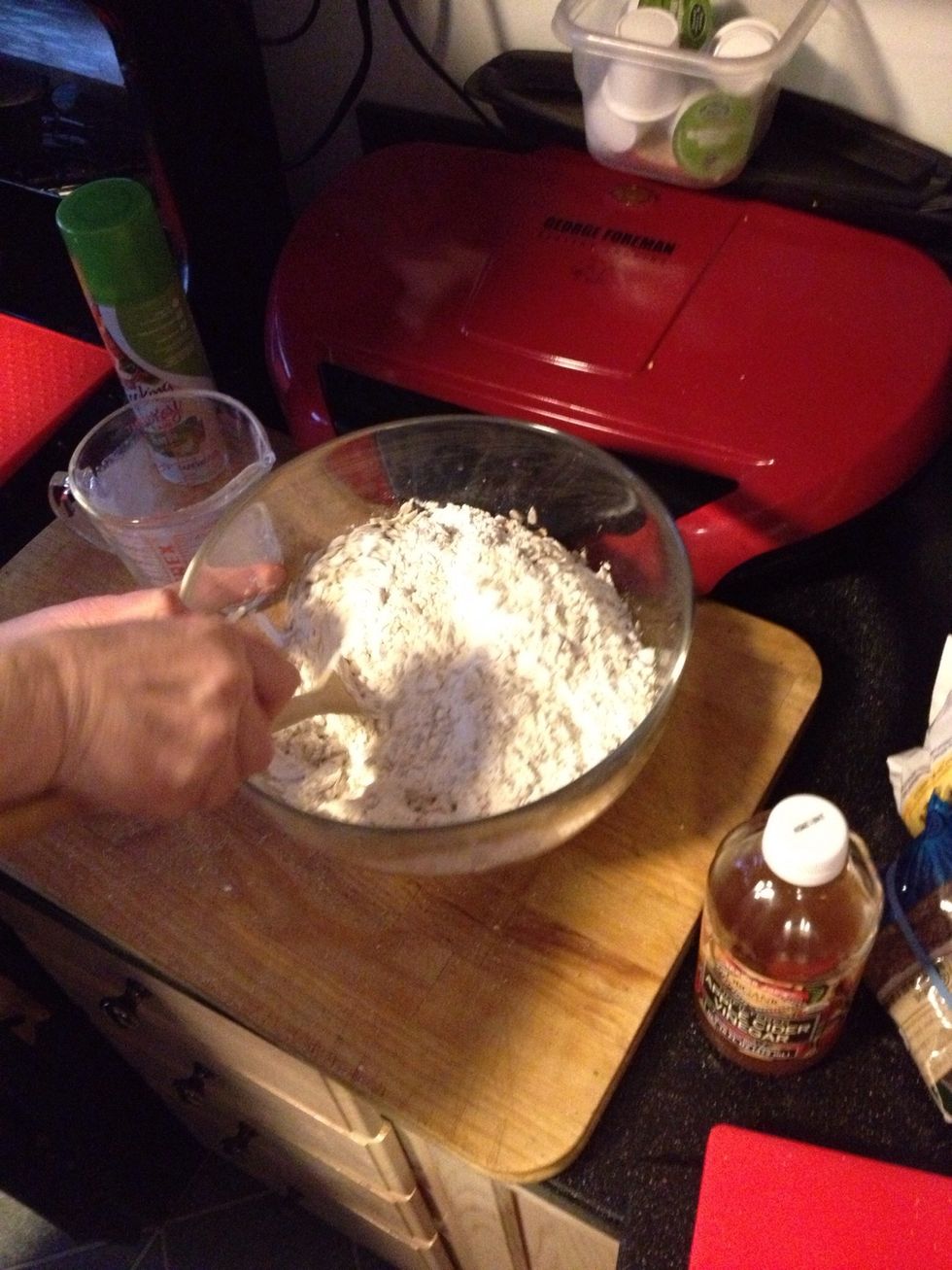 Mix together as you go, adding more and more in.