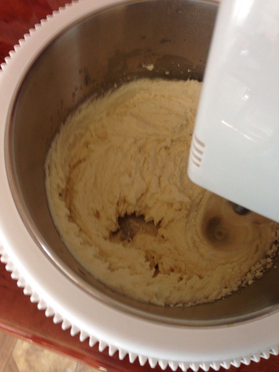 Mix together butter and sugar until pale