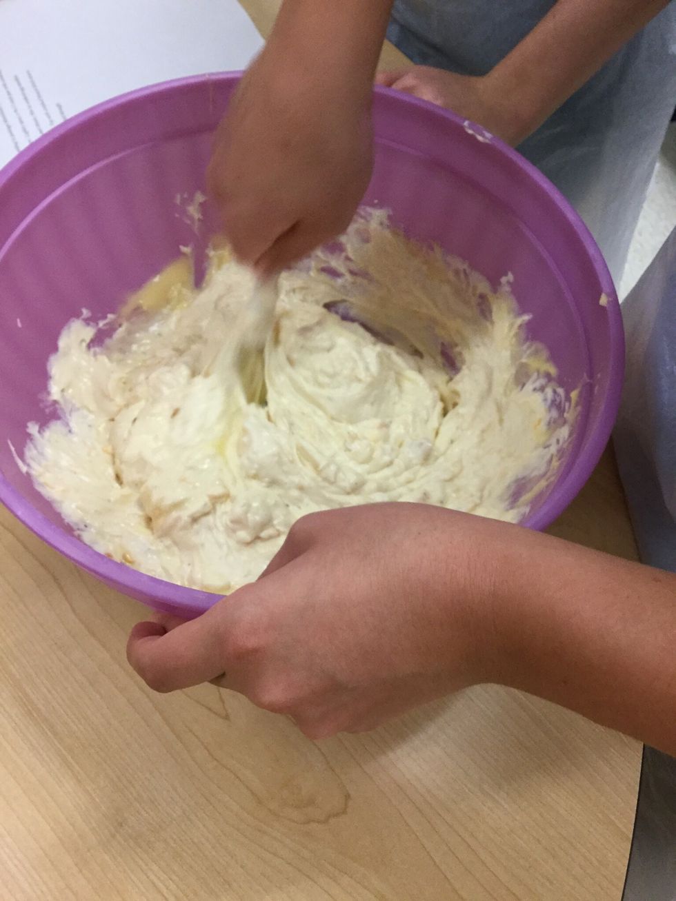 Mix together chicken, soup, onion dip, and cheese.