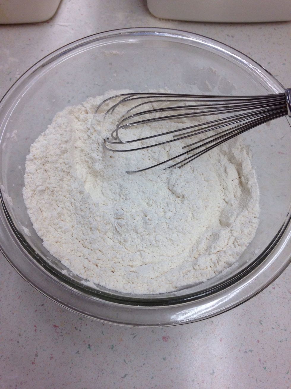 Mix together flour, baking powder, baking soda, and salt in a medium sized bowl.