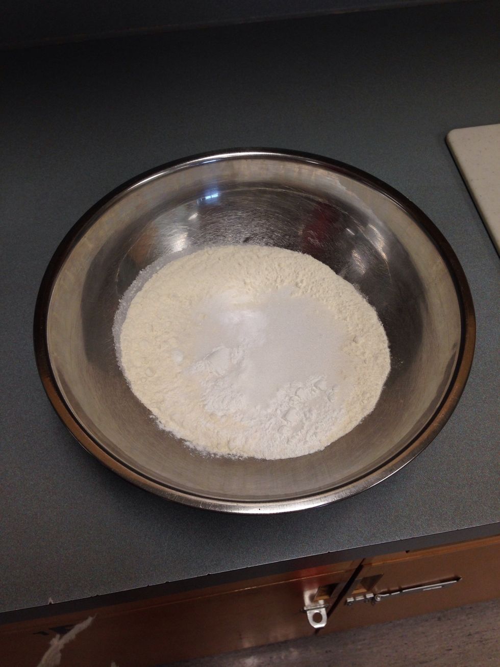 Mix together flour, sugar, baking soda, baking powder and salt in a large mixing bowl