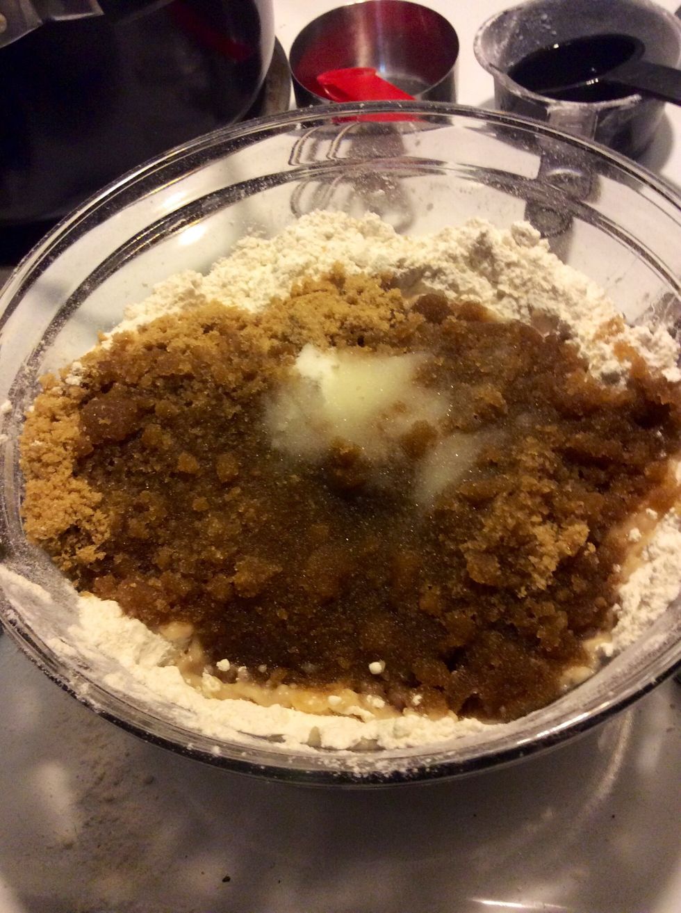 Mix together four, brown sugar, salt, and vegetable oil to form a crumb like mixture