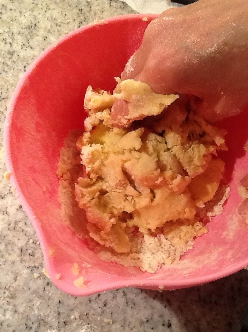 Mix together in a bowl butter, wheat flour, almond paste and vanilla sugar, you can use your hand ore mix in the bake machine.